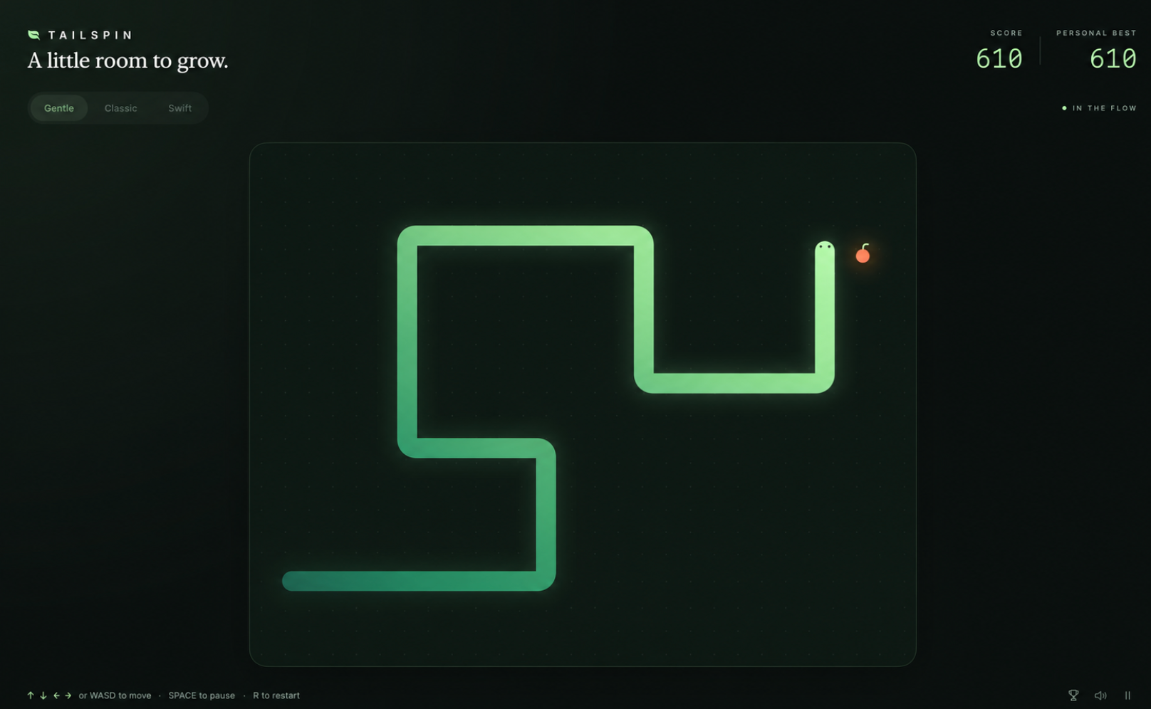 Tailspin gameplay preview showing a glowing green snake on a dark board